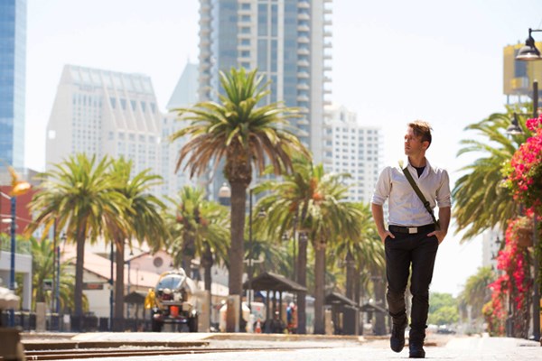 young professional walks in southern california
