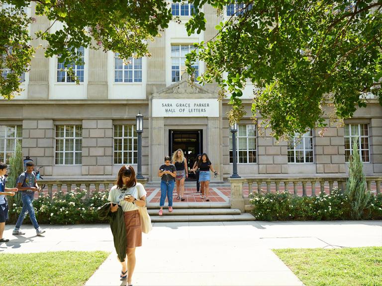 Students exiting the Hall of Letters after classes in the afternoon.