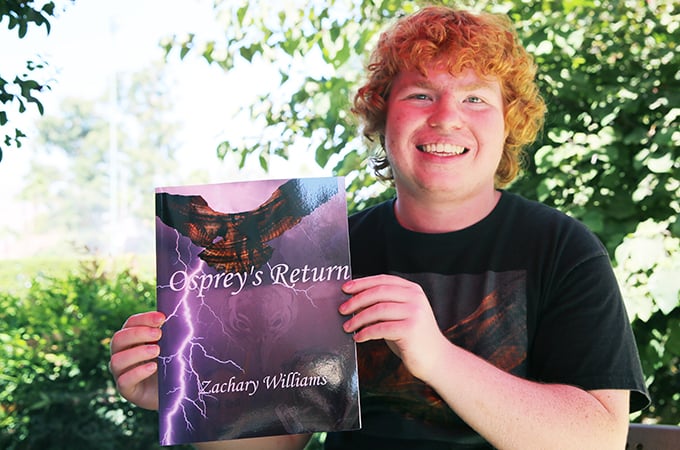Zach Williams '21 with his new novel
