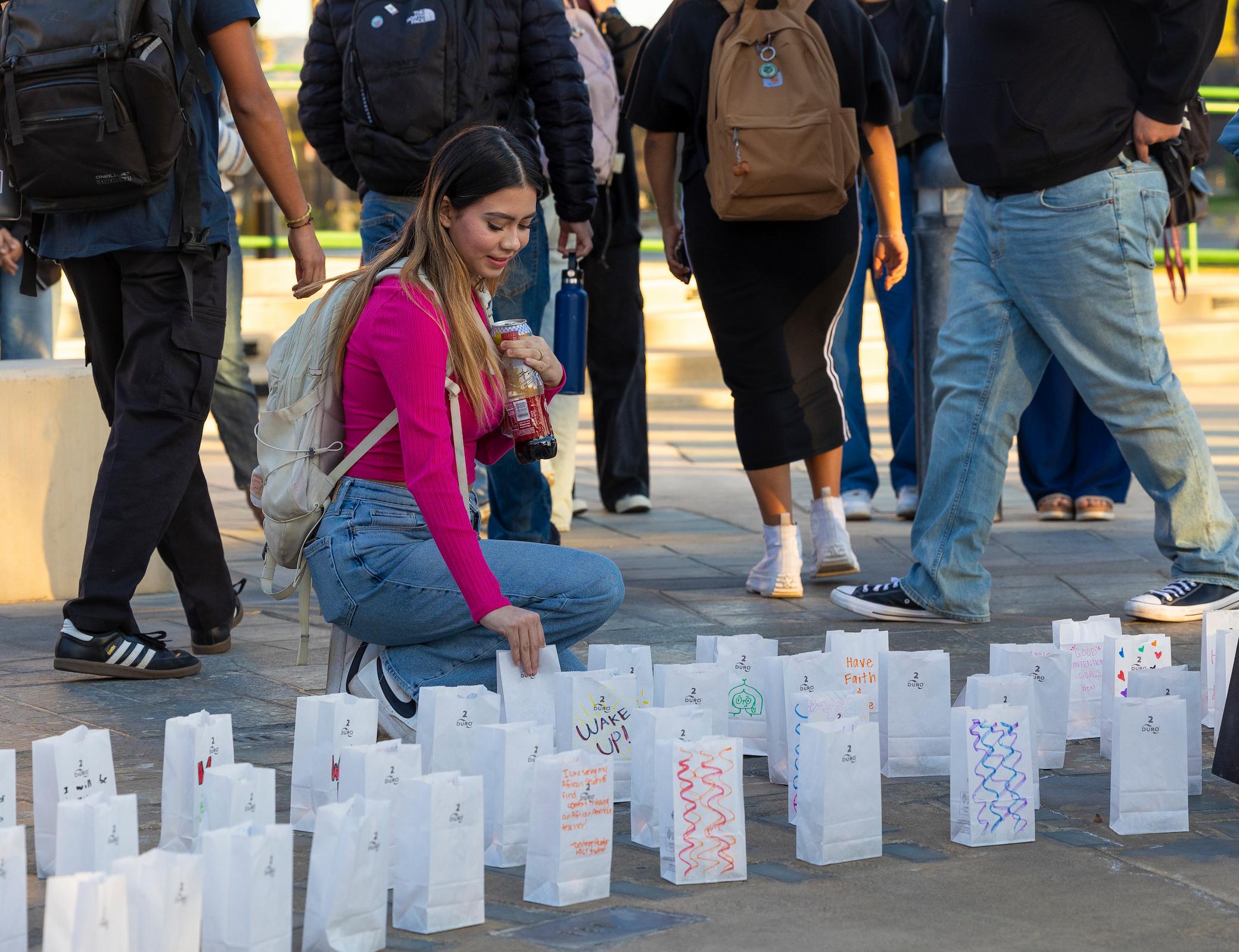 Student at Luminaria Ceremony