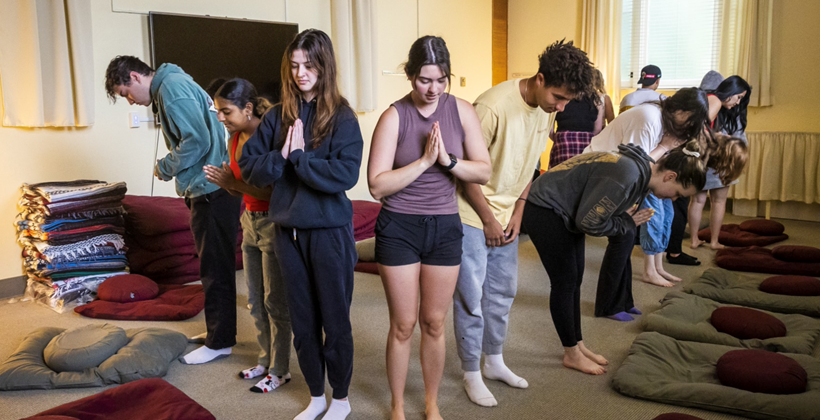 Students engaged in the May Term course "Neuroscience of Meditation"  in the Meditation Room at the U of R.