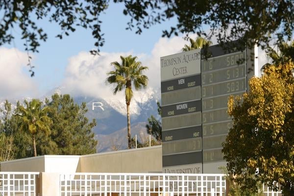 Aquatic center scoreboard with the Redlands R on the mountain in the background