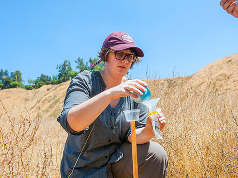 student-outdoors-learning-science