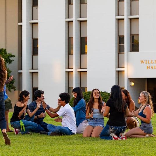 Media card - first-year students on the lawn