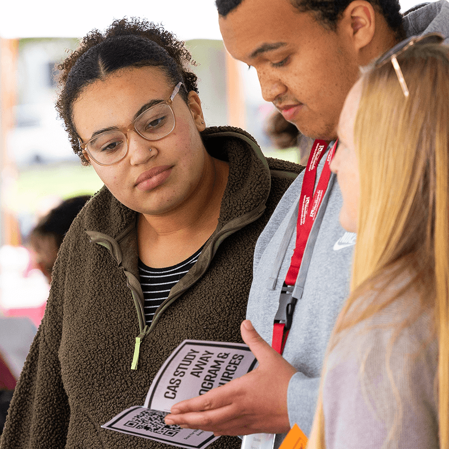 Image Carousel - prospective students viewing brochure