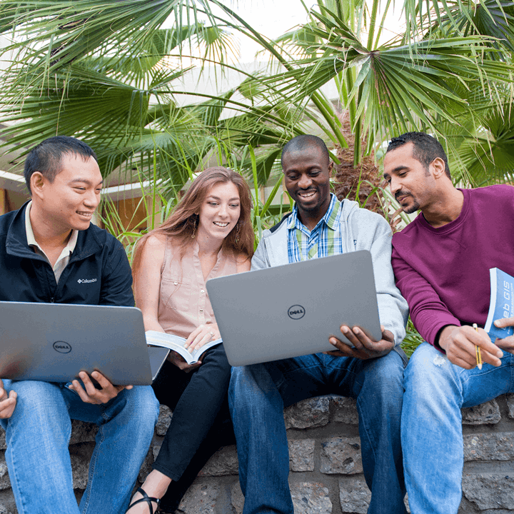 Image card - graduate students on laptops