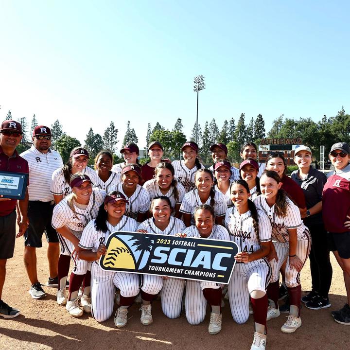 UofR softball team posing for photo after winning 2023 SCIAC tournament championship.