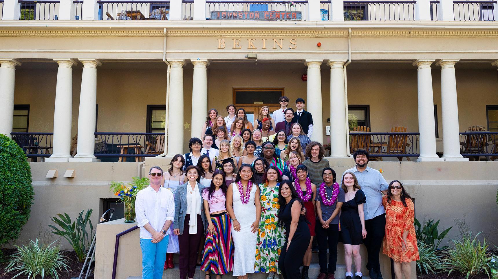 Program media masthead - Johnston students at graduation ceremony in front of Bekins Hall