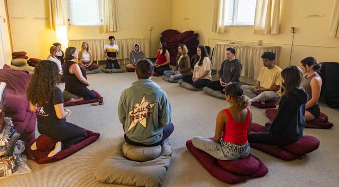 Students participating in Zazen- Buddhist sitting meditation.