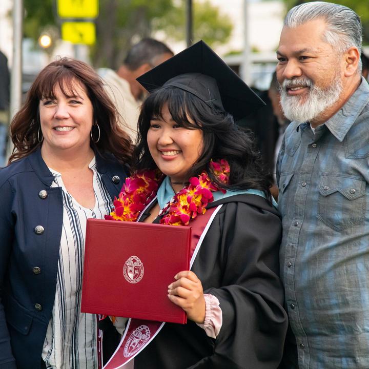 Mutiple media - student graduation day with family